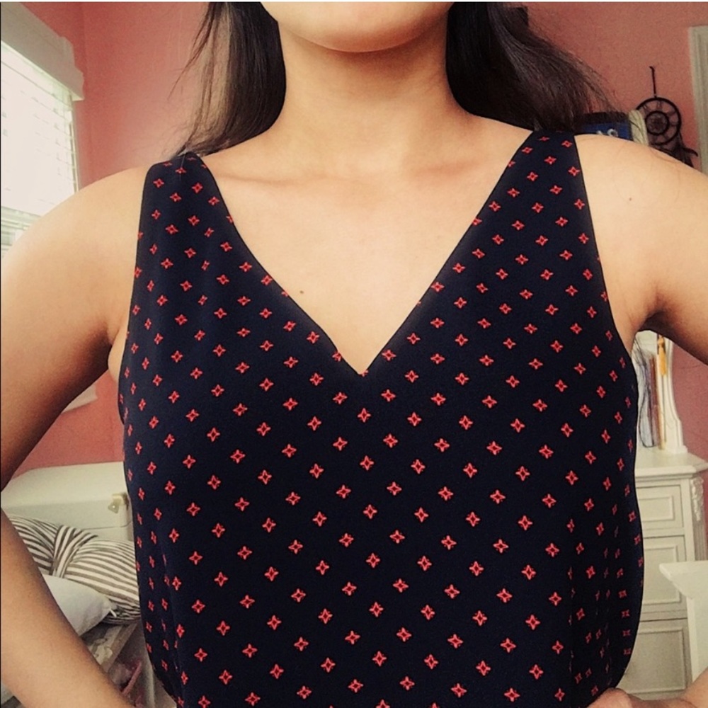 Express red and black cross cross top